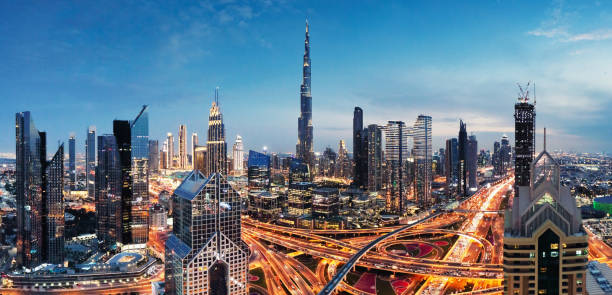 Dubai skyline at dusk, showcasing high-rise buildings and bustling cityscape, relevant for real estate investments.